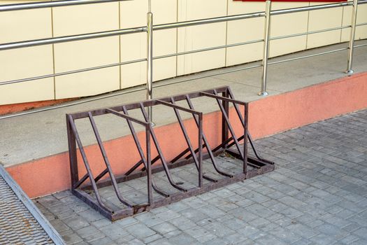 iron parking for bicycles near the store