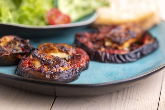 grilled eggplants with cheese and salad