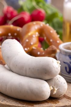 three bavarian white sausages with mustard