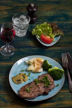 steak with broccoli on a plate