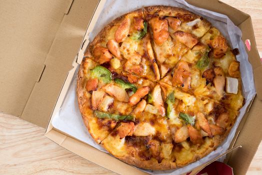 BBQ chicken supreme pizza in package box