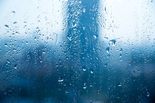 natural water drops on glass window