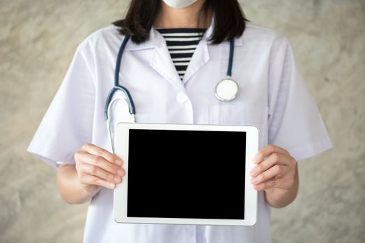 woman doctor showing  tablet screen