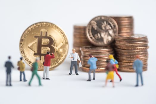 business miniature man present Cryptocurrency golden bitcoin ,digital currency