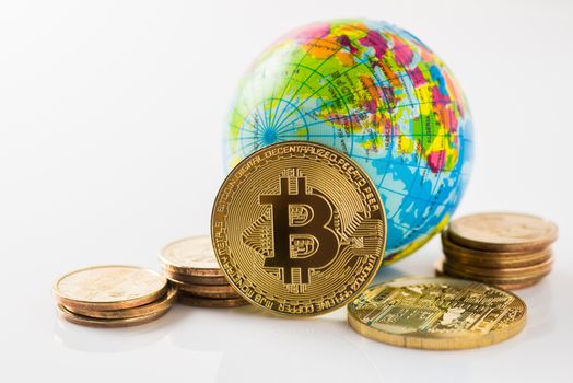 Cryptocurrency golden bitcoin , dollars money and globe , digital currency concept