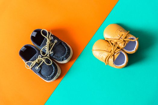 kids fashion shoes on orange green paper background