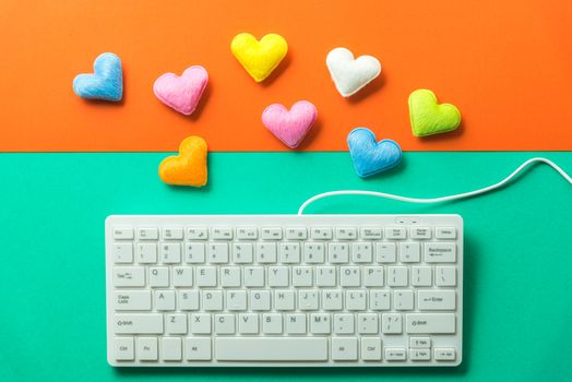 mini heart splash out from computer keyboard , valentine concept