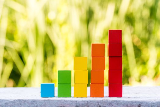 Colorful stack of wood cube building blocks