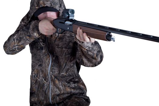 Hunter in camouflage clothing with a gun on white background isolated. The man with the shotgun. Young guy in a camo suit with a gun. Soldier, trooper on white background.