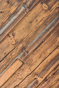 Diagonal wooden planks with natural texture. Close up for use as a background.