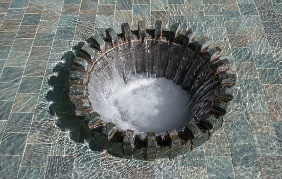 Modern fountain water. Overhead view.