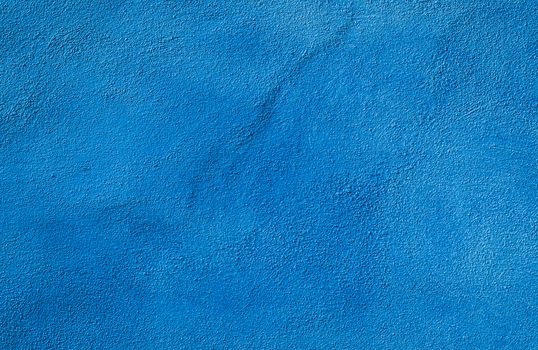 Mediterranean wall background, light blue colored texture.