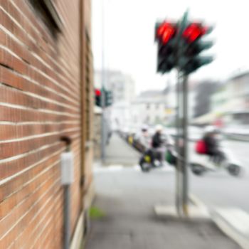Blur image of mopeds and traffic in the city for abstract background