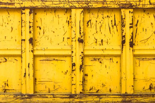 Closeup of a yellow rubble container. it can be used as background