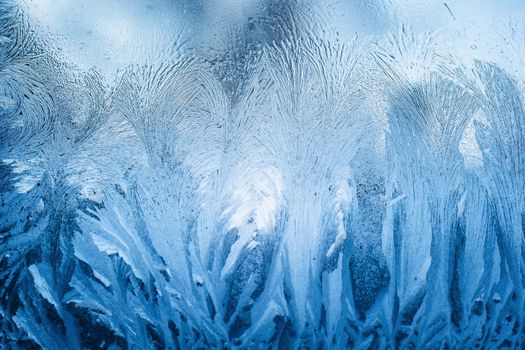 Frosty natural pattern on winter window