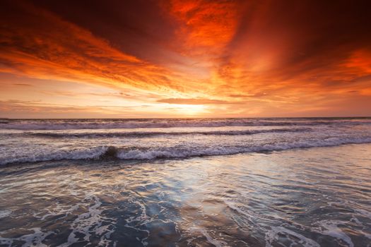 Glowing majestic sunset over tropical sea, beautiful natural background