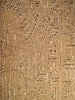 Ancient Egypt tomb hieroglyphs stone wall background