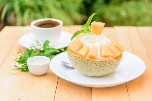 Melon Bingsu with Sweetened Condensed Milk on wood table