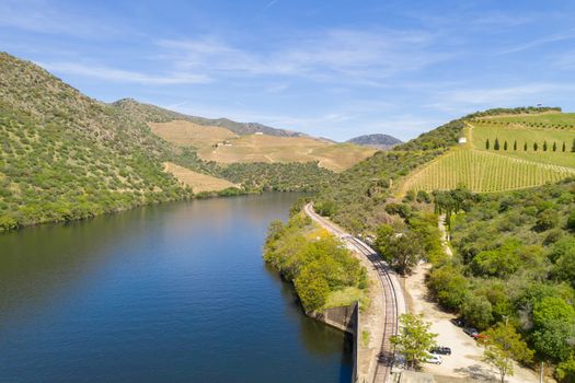 Douro railway drone aerial view of river wine region in Ferradosa, Portugal