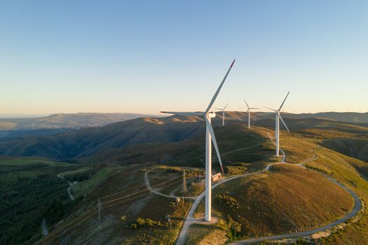 Wind turbines drone aerial view renewable energy on the middle of Serra da Freita Arouca Geopark, in Portugal