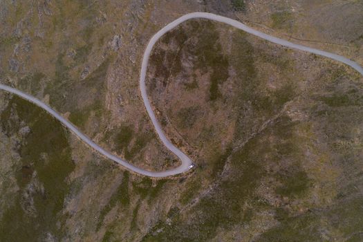 Serra da Freita drone aerial top view in Arouca Geopark road at sunset, in Portugal