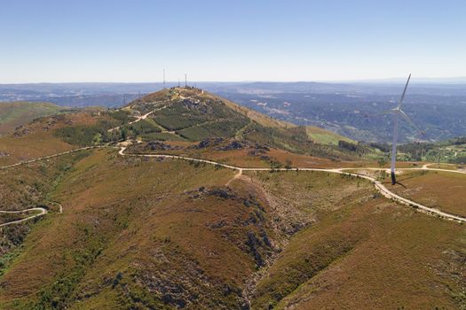 Wind turbines drone aerial view renewable energy on the middle of Serra da Freita Arouca Geopark, in Portugal