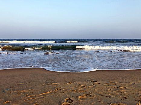 Beautiful view of seashore with sea waves during the summer season