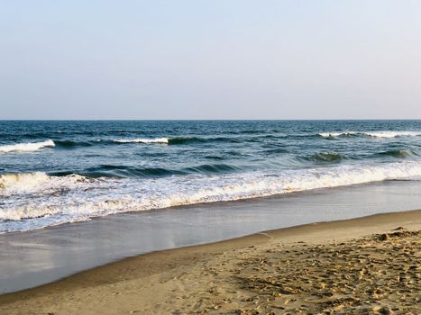 Beautiful view of seashore with sea waves during the summer season