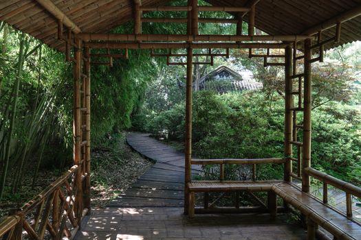 Ancient bamboo cabin and the path, Suzhou garden, in China. Photo in Suzhou, China.