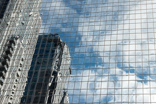 Futuristic view of Toronto glassy skyscraper walls reflected in each other, Canada