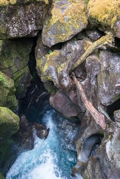 Eroded fancy rock formations at the Chasm Viewing Bridge at Milford Sound, New Zealand