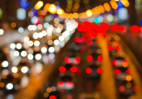 Abstract blurred colorful circles (defocused night freeway scene), suitable as a background