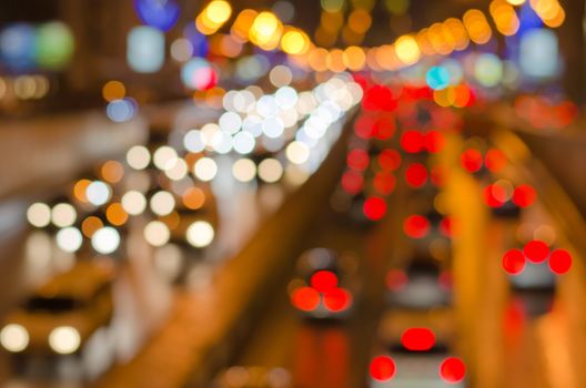 Abstract blurred colorful circles (defocused night freeway scene), suitable as a background