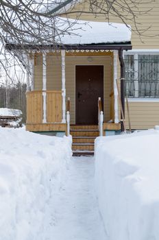 It is very snowy winter 2010-2011, so, we need to dig the track in the snow to get to cottage door