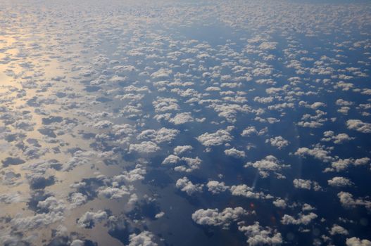 Aerial view of the goup of cumulus clouds over Read Sea in natural colors