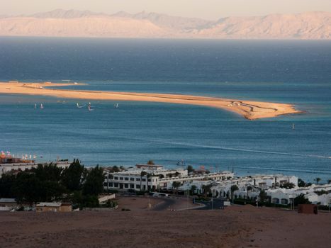 This is a general view of the Dahab's gulf with the spit and distant mountains