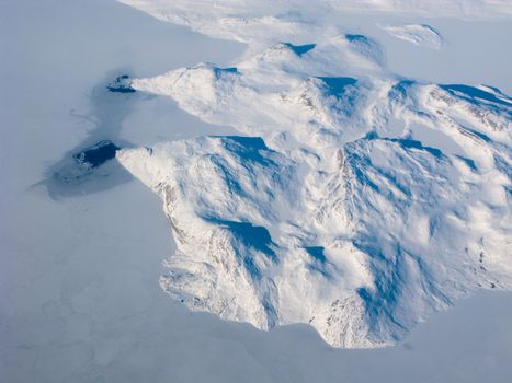 Aerial view of the Greenland with mountain, ocean and ice holes