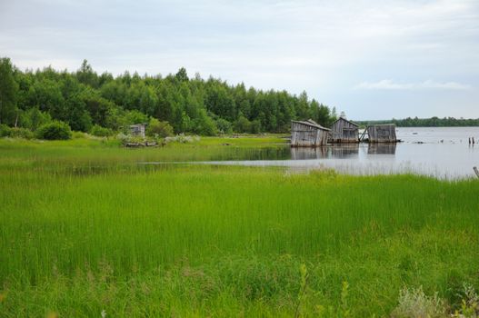 The picture shows abandoned and broken slip docs in a small settlement in Russia's Karelia region