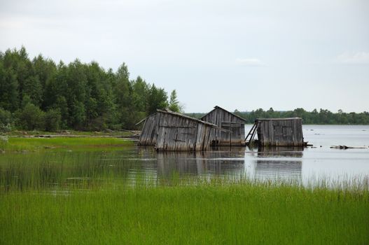 The picture shows abandoned and broken slip docs in a small settlement in Russia's Karelia region