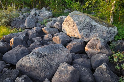 The picture shows huge boulders, which a typical backgroud of every island in south region of Karelia republic