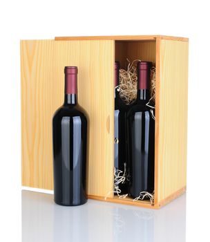 A gift box of cabernet sauvignon wine bottles isolated on white with reflection.