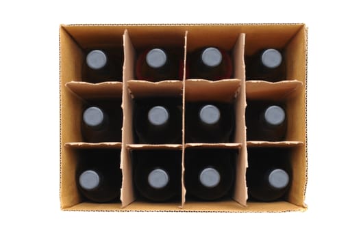 Overhead view of a twelve bottle case of red wine over a white background. 