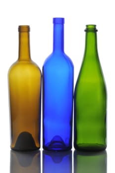 Three Empty Wine Bottles Back lit with reflections isolated on white