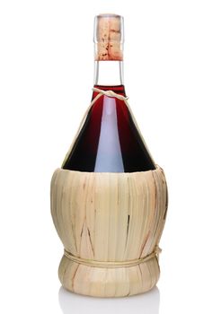 A single bottle of Chianti wine with a wicker basket base. Vertical format isolated on white with reflection.