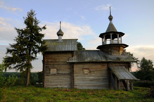 This is the picture of the old rural Russian christian church on a hill