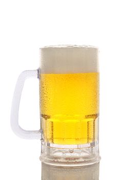 A cold frosty mug of beer on a white background. Vertical with reflection.