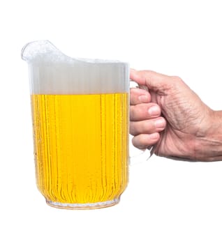 Closeup of a man's hand holding a pitcher of beer, isolated on white.