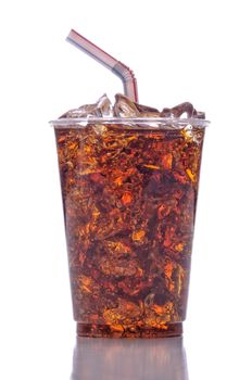 Clear Plastic Cup with Soda Ice and Straw isolated on white with reflection vertical format
