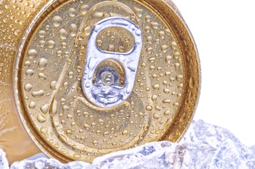 Close Up of a Golden Soda Can with Pull Tab and Condensation white background copyspace