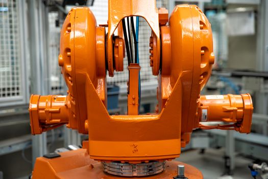 Detail of a robotic arm in a factory, auto industry.